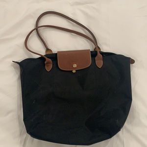 Worn for sure but still great classic Longchamp
